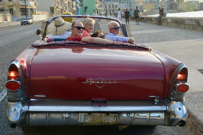 Driving along Havana's El Malecon (photographed by Yosel Vazquez of I Love Cuba Photo Tours)