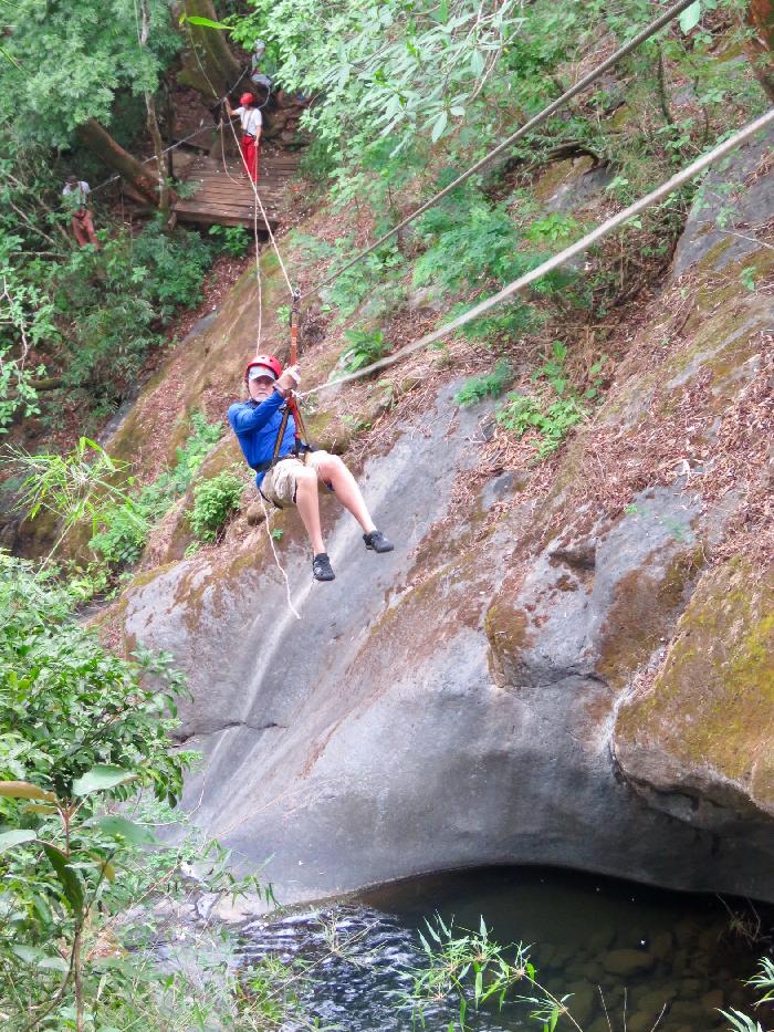 Rappelling Over the Waterfall Pool