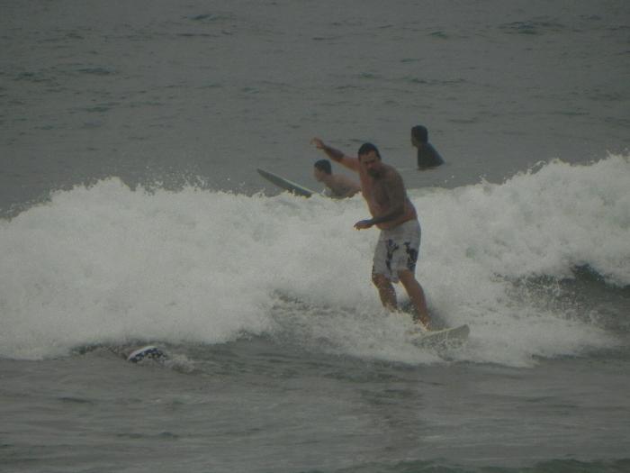 Surfers at Papenoo Beach