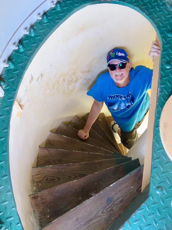 Scott maneuvering the steps inside California Lighthouse