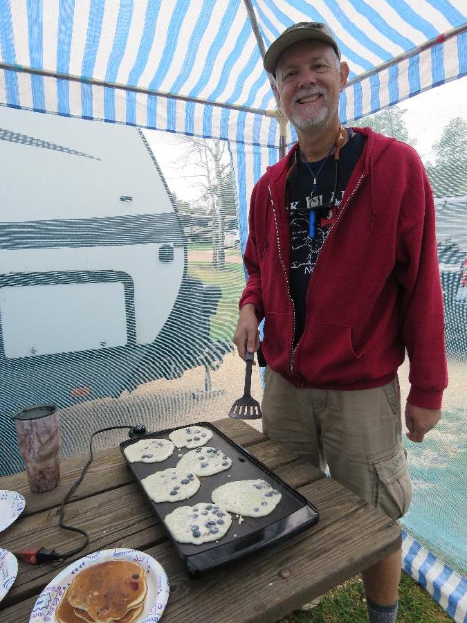 Scott Flipping Blueberry-Pecan Pancakes for Breakfast