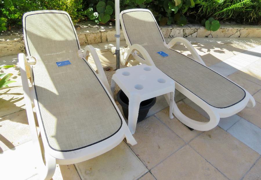 Clean and Disinfected Poolside Lounge Chairs