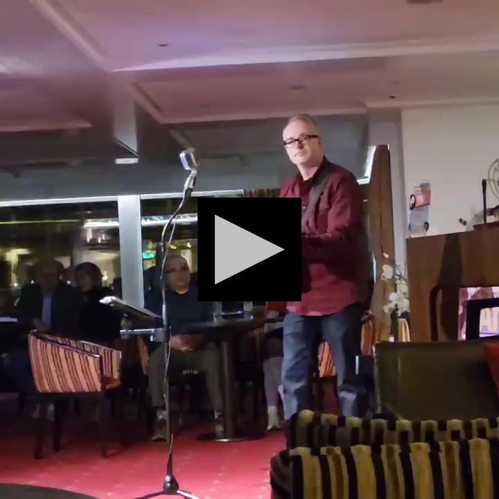 The Gentleman of the Guitar aboard the Monarch Queen