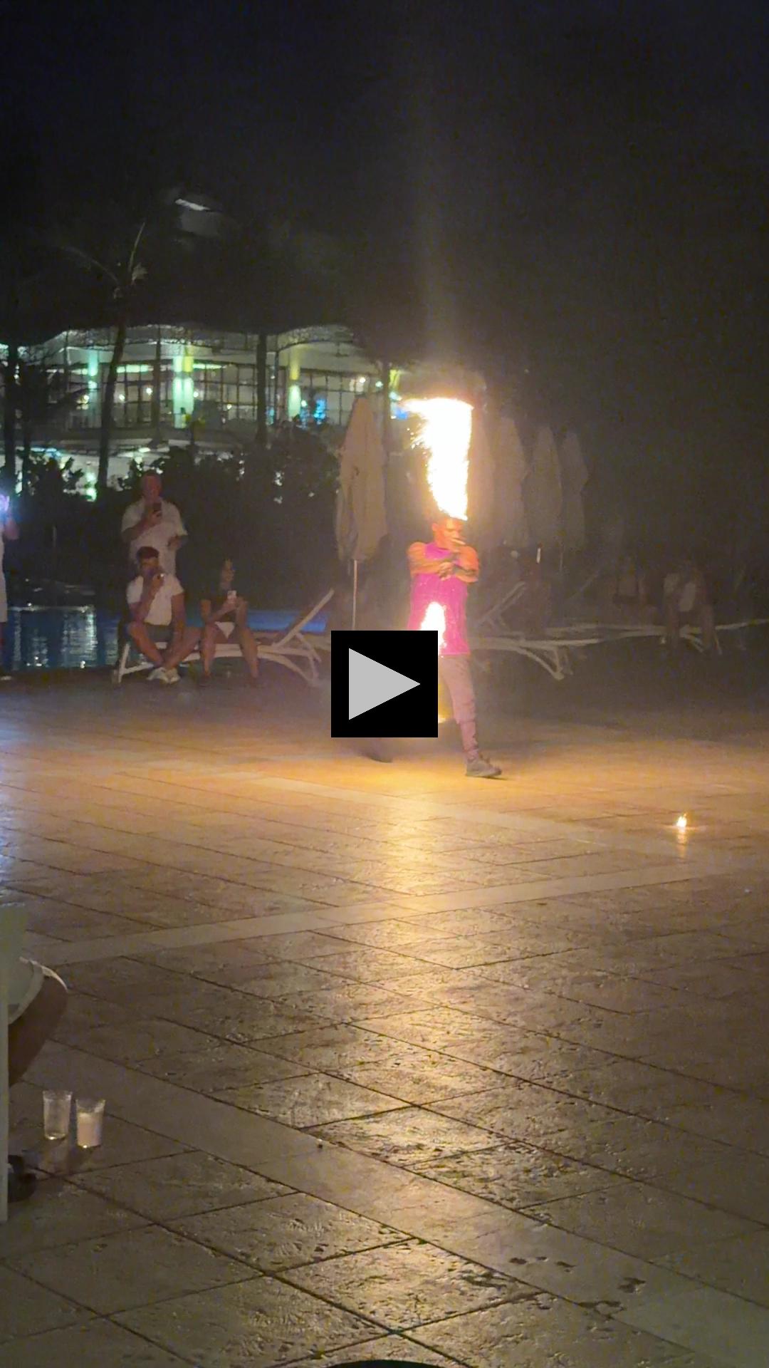 Spinning, Twisting and Twirling with Fire in Both Hands