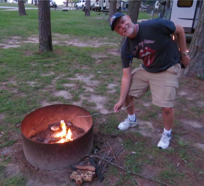 Grilling Marshmallows for S'mores - YUM!