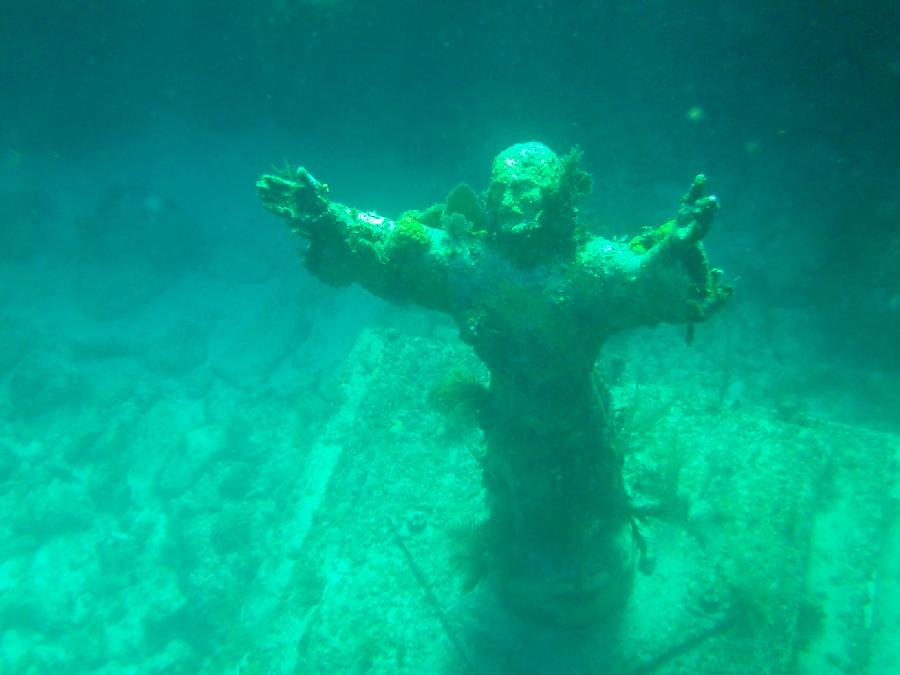 Snorkeling over the Christ of the Abyss Statue